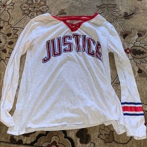 A gray justice shirt.